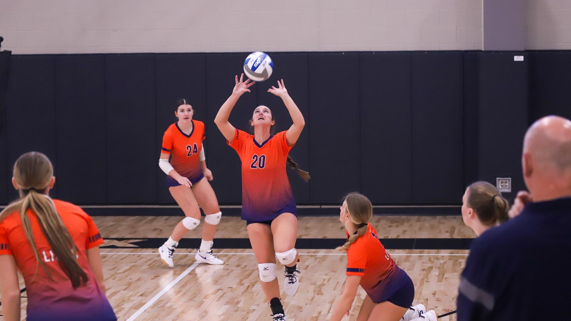 Ali Price (20) sets the ball for a teammate in a match earlier this season.